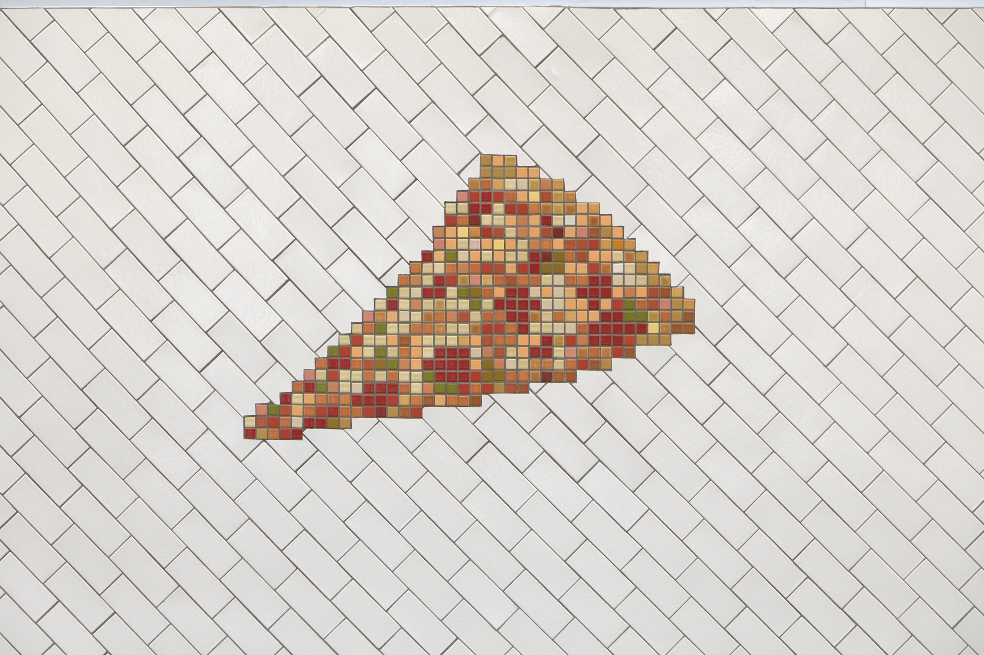 A close-up of a tiled mosaic featuring a slice of pizza set against a white background.